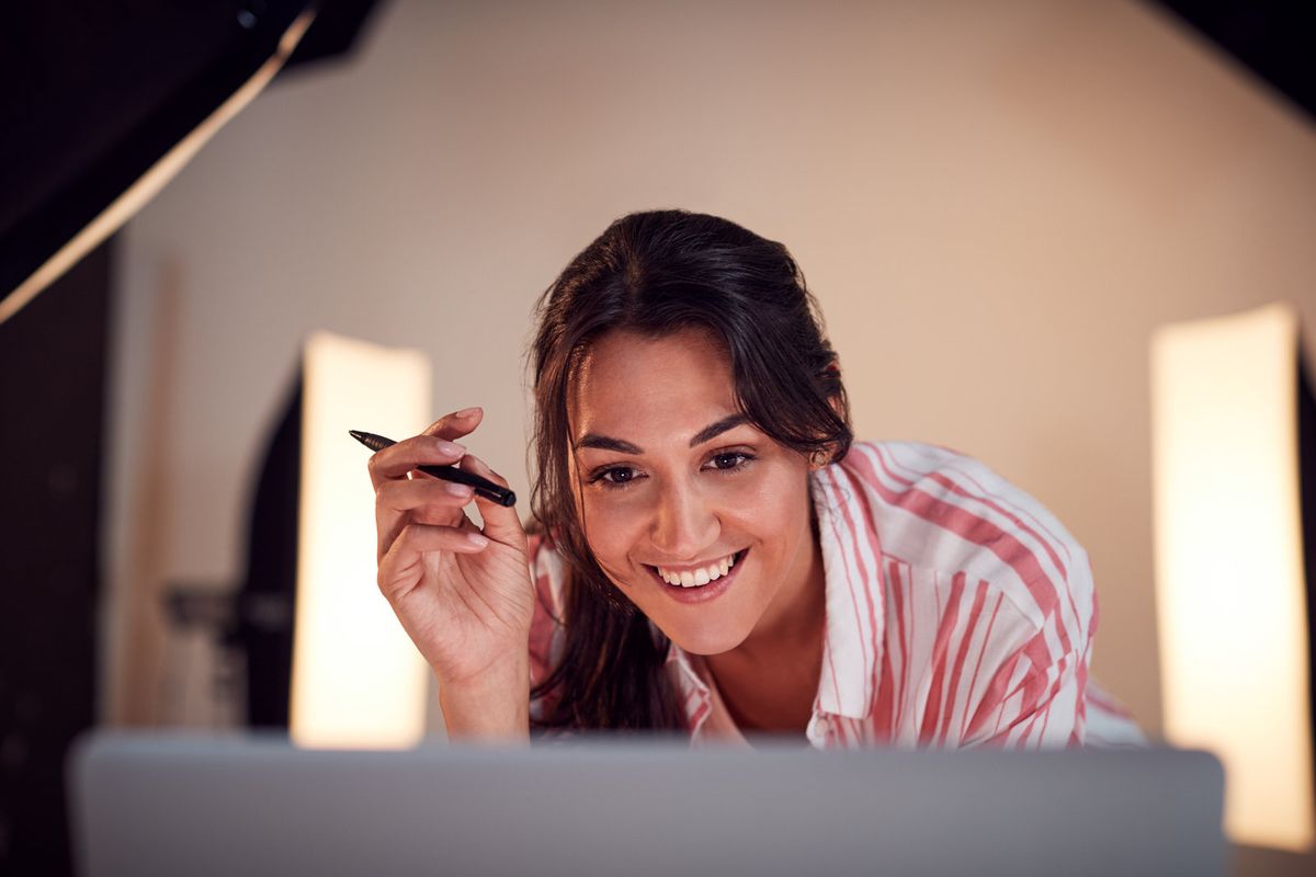 A tutor reviewing work with a student during an online session